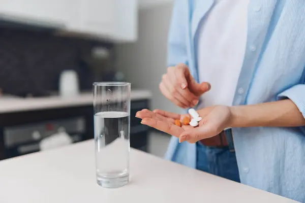 Woman Taking Medication Home Kitchen Pills Glass Water Counter — Stock Photo, Image