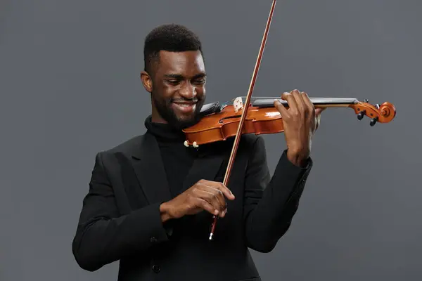 African American Man Playing Violin Grey Background Showcasing Talent Passion — Stock Photo, Image
