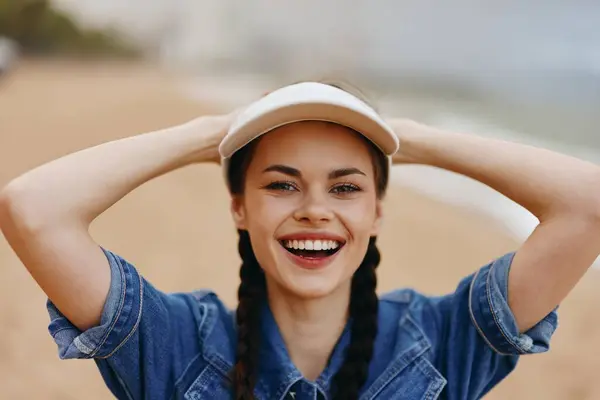 Happy Young Woman, Portrait of an Attractive Caucasian Lady in Fashionable Summer Hat, Smiling and Laughing Outdoors with Nature Background