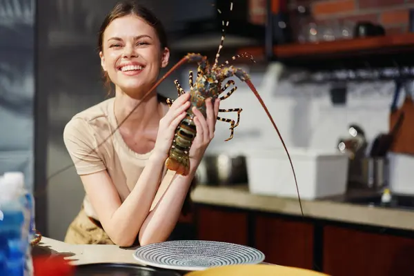 Woman Holding Lobster Kitchen Table Preparing Seafood Dinner Cozy Home — Stock Photo, Image