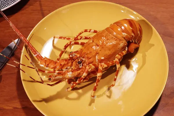Delicious Lobster Dish Served Yellow Plate Knife Fork Ready Enjoyed — ストック写真