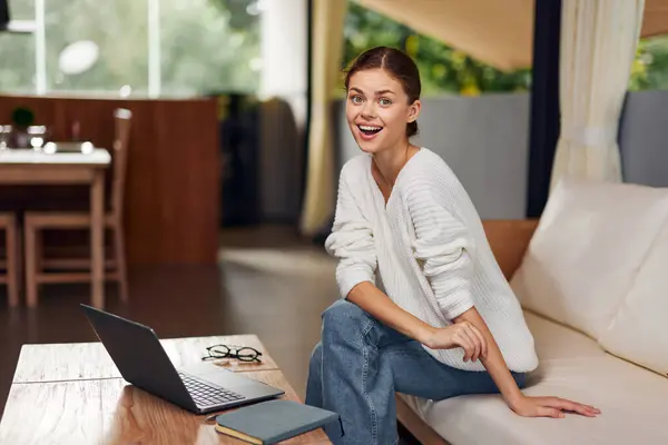Smiling Woman Enjoying Weekend Relaxation Cozy Modern Living Room While Stok Gambar