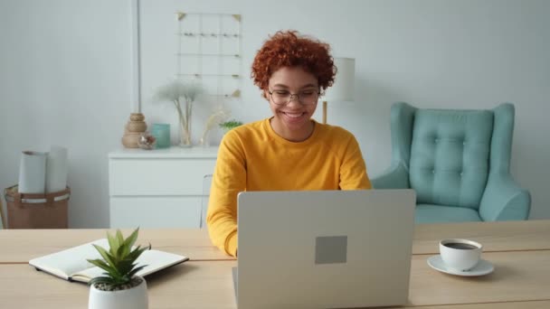 African American Girl Using Laptop Home Office Looking Screen Typing — Stock video