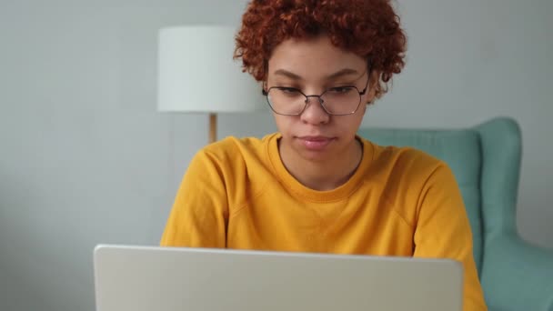 African American Girl Using Laptop Home Office Looking Screen Typing — Video