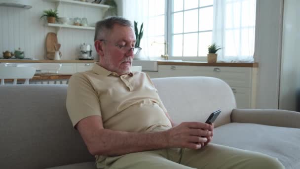 Happy Middle Aged Senior Man Holding Using Smartphone Touch Screen — Stock Video