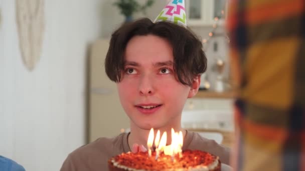 Make Wish Man Wearing Party Cap Blowing Out Burning Candles — Stock Video