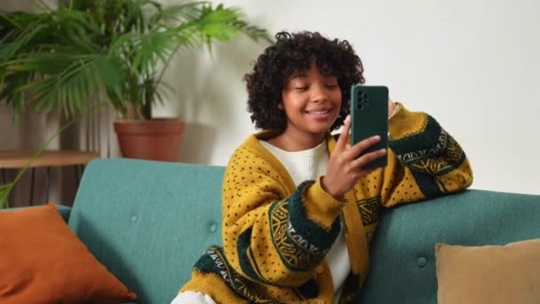 African American Girl Holding Smartphone Having Video Chat Female Blogger — Vídeos de Stock