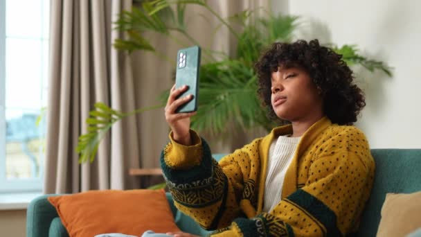 African American Girl Holding Smartphone Having Video Chat Female Blogger — Vídeos de Stock