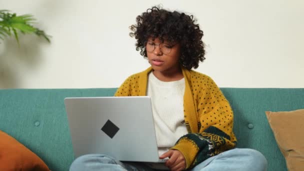 African American Girl Using Laptop Home Office Looking Screen Typing — Stock video