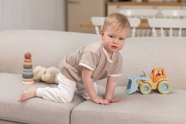 Happy Baby Cute Little Boy Playing Toys Couch Indoors Kid Royalty Free Stock Photos