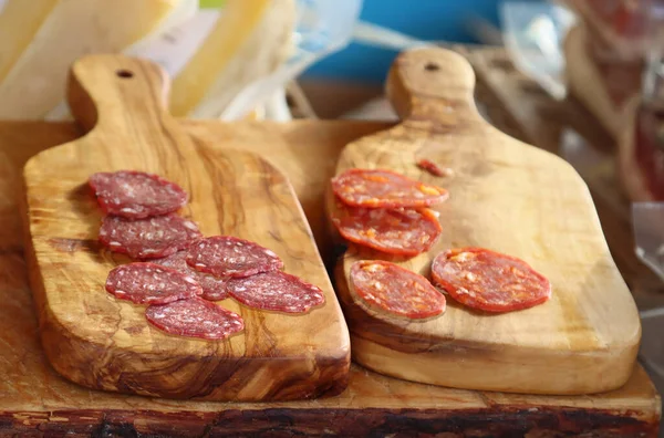 olive wood cutting board with cold cuts