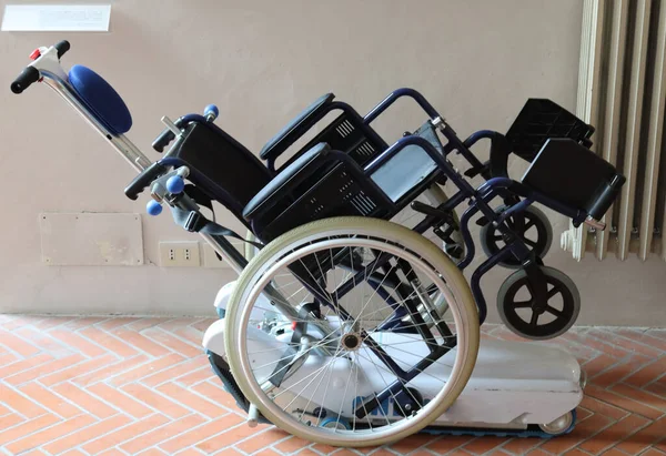 Motorized wheelchair to climb stairs for the disabled