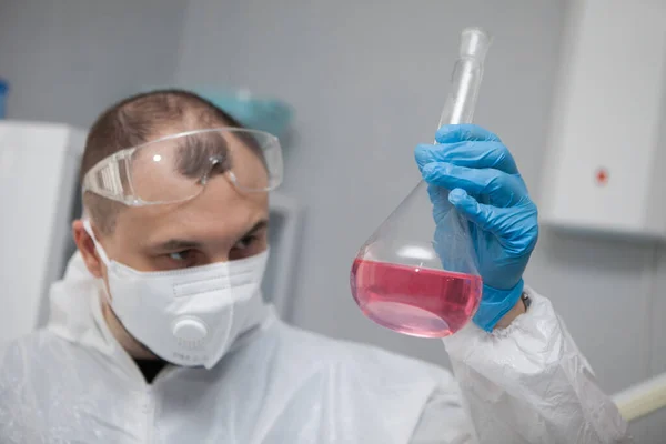 Scientific Virologist Biologist Protective Suit Blue Gloves Holds Flask Substance — Foto Stock