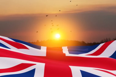 National flags of United Kingdom with flying birds on sunset sky background. Background with place for your text. 3d rendering.