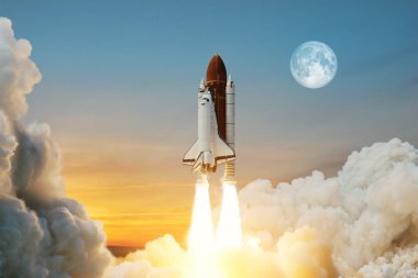 Spaceship lift off. Space shuttle with smoke and blast takes off into space on a background of a sunset with a full moon in the sky. Elements of this image furnished by NASA. clipart