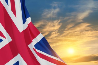 Günbatımı arka planında Birleşik Krallık bayrakları. Mesajınız için arka planda yer alın. 3d oluşturma.