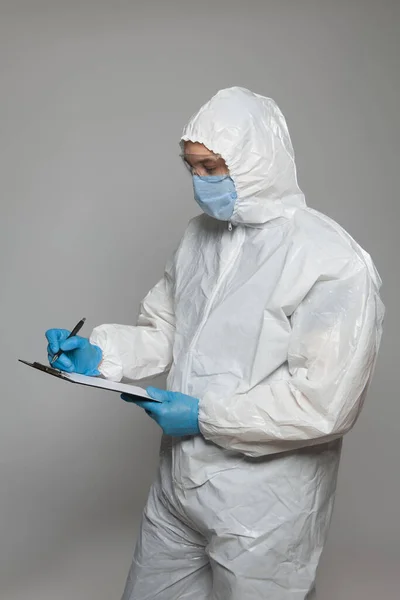 Scientific Virologist Biologist Protective Suit Blue Gloves Takes Notes Viruses — Photo