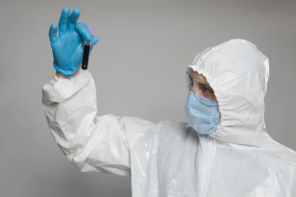 Scientific Virologist Biologist Protective Suit Blue Gloves Holds Test Tube — Photo