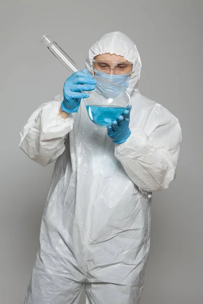 Scientific Virologist Biologist Protective Suit Blue Gloves Holds Big Flask — Photo