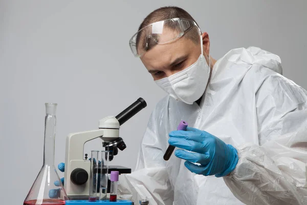 Scientific Virologist Biologist Protective Suit Blue Gloves Holds Test Tube — Photo