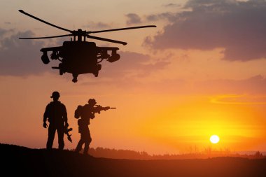 Gün batımının arka planında helikopter ve asker siluetleri. Gaziler Günü için tebrik kartı, Anma Günü, Hava Kuvvetleri Günü. ABD kutlaması.
