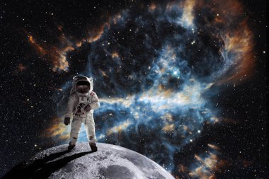 Astronaut at the spacewalk on the moon. National Moon Day. Space Exploration Day. Elements of this image furnished by NASA.