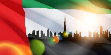 View of the Dubai skyline with bright sun on the flag of the United Arab Emirates. UAE celebration. National day, Flag day, Commemoration day, Martyrs day.