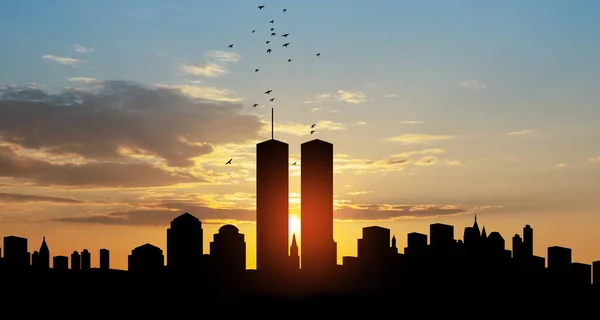 New York skyline silhouette with Twin Towers and birds flying up like souls at sunset. 09.11.2001 American Patriot Day banner.