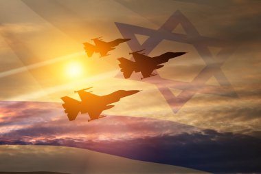 Aircraft silhouettes on background of sunset with a transparent waving Israel flag. Military aircraft. Independence day. Air Force Day.