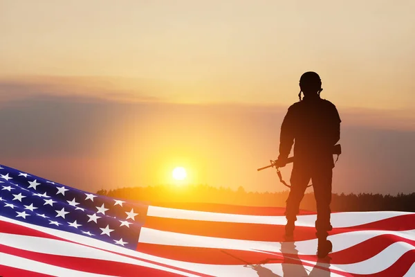 stock image Outgoing soldier with nation flag on a background of sunset or sunrise. Greeting card for Veterans Day, Memorial Day, Independence Day. America celebration. 3D-rendering.