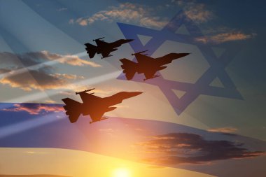 Aircraft silhouettes on background of sunset with a transparent waving Israel flag. Military aircraft. Independence day. Air Force Day.