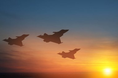 Air Force Day. Aircraft silhouettes on background of sunset or sunrise.