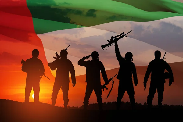 Uaeの旗と日没や日の出を背景に兵士のシルエット 国民の祝日の概念 記念日 — ストック写真