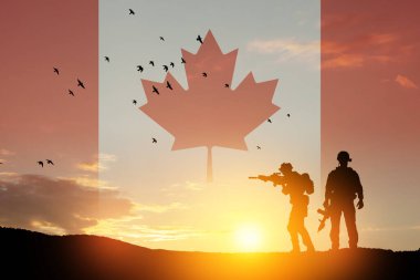 Canada army soldiers on a background of sunset or sunrise and Canada flag. Greeting card for Poppy Day, Remembrance Day. Canada celebration. Concept - patriotism, honor.