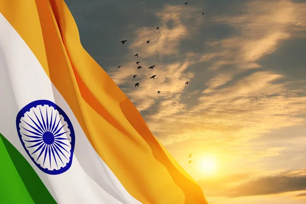 stock image Waving India flag on sunset sky with flying birds. Background with place for your text. Indian independence day, 15 August. 3d-rendering.