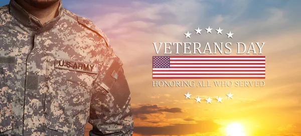 USA soldier in uniform on sunset sky background with USA flag and Text. Memorial Day or Veterans day concept.