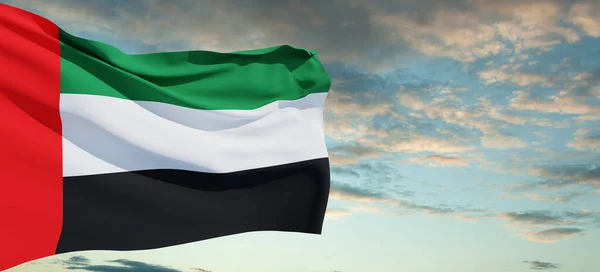 stock image Flag of United Arab Emirates on background of blue sky. UAE celebration. National day, Flag day, Commemoration day, Martyrs day. Banner with place for text.