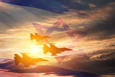 Aircraft silhouettes on background of sunset with a transparent waving Israel flag. Military aircraft. Independence day. Air Force Day.