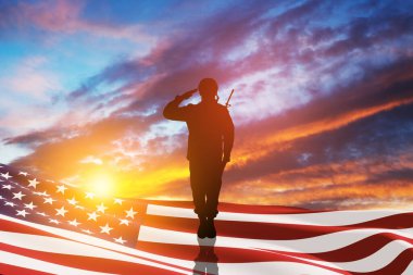 USA army soldier saluting with nation flag on a background of sunset or sunrise. Greeting card for Veterans Day, Memorial Day, Independence Day. America celebration. 3D-rendering.