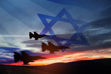 Aircraft silhouettes on background of sunset with a transparent waving Israel flag. Military aircraft. Independence day. Air Force Day.