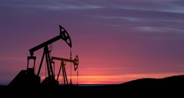 The change in oil prices caused by the war. Oil prices are rising because of the global crisis. Oil drilling derricks at desert oilfield. Crude oil production from the ground. Petroleum production. clipart