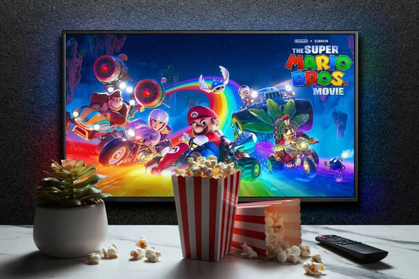 Screen Playing Super Mario Bros Movie Trailer Movie Remote Control — Stock Photo, Image