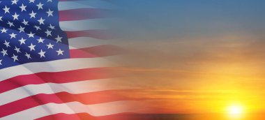 United States of America flag on sky at sunset or sunrise background. Independence day, Memorial day, Veterans day. Banner.