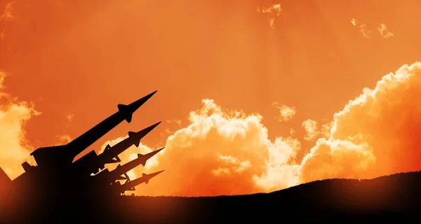 stock image The missiles are aimed at the sky at sunset. Nuclear bomb, chemical weapons, missile defense, a system of salvo fire.