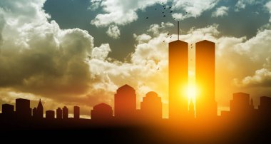 New York skyline silhouette with Twin Towers and birds flying up like souls at sunset. 09.11.2001 American Patriot Day banner.