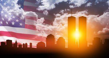 New York skyline silhouette with Twin Towers and USA flag at sunset. 09.11.2001 American Patriot Day banner.