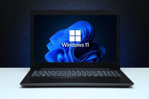 Windows Logo Screen Laptop Computer Black Textured Wall Blue Light — Stock Photo, Image