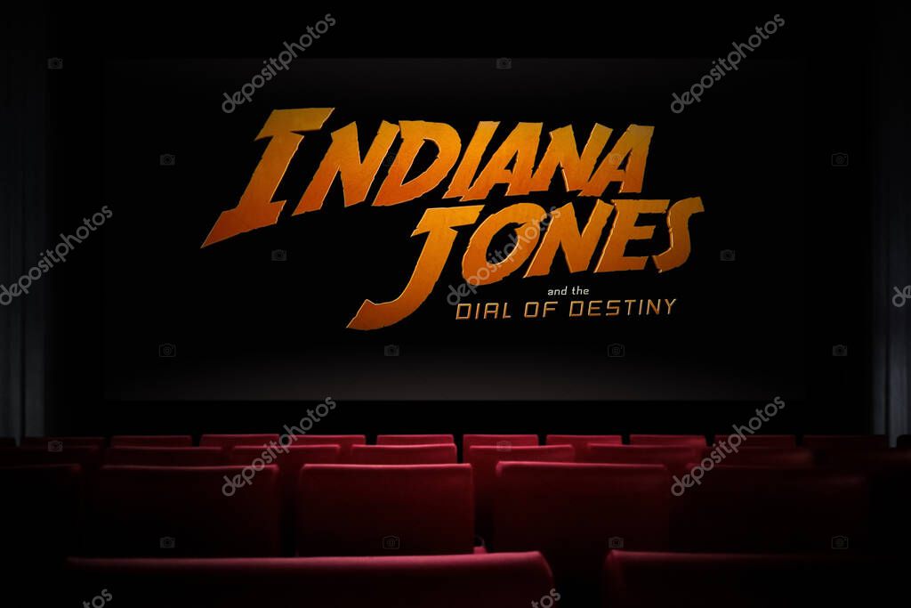 TV screen playing Indiana Jones and the Dial of Destiny trailer or movie. TV on black textured wall. Astana, Kazakhstan - May 15, 2023.