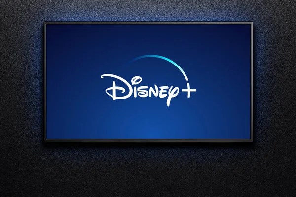 Disney Artı Logo Ekranında Televizyon Siyah Desenli Duvarda Disney Bir — Stok fotoğraf