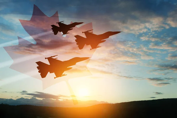 Air Force Day. Aircraft silhouettes on background of sunset with a transparent Canadian flag. Since 2006, the Royal Canadian Air Force has celebrated Air Force Day on 4 June.